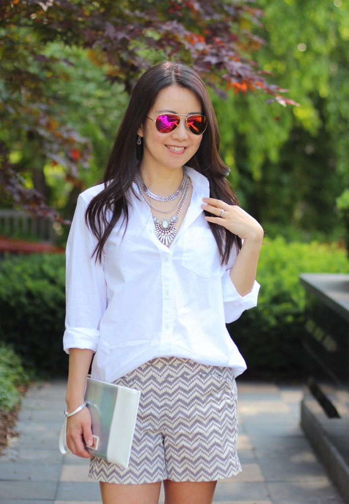 summer fashion, casual glam, classic white shirt, Banana Republic white button down shirt, print shorts, Anthropologie chevron print shorts, Happiness Boutique, layered necklace, Express clutch, date night outfit