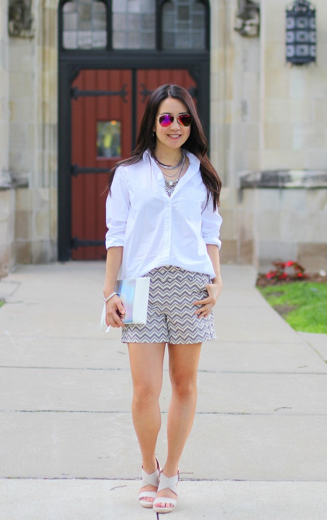 summer fashion, casual glam, classic white shirt, Banana Republic white button down shirt, print shorts, Anthropologie chevron print shorts, wedges, Happiness Boutique, layered necklace, Express clutch, date night outfit
